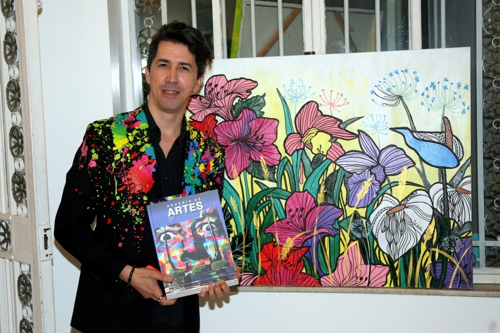 Na exposição com sua obra o artista e pintor, Gil Motta 